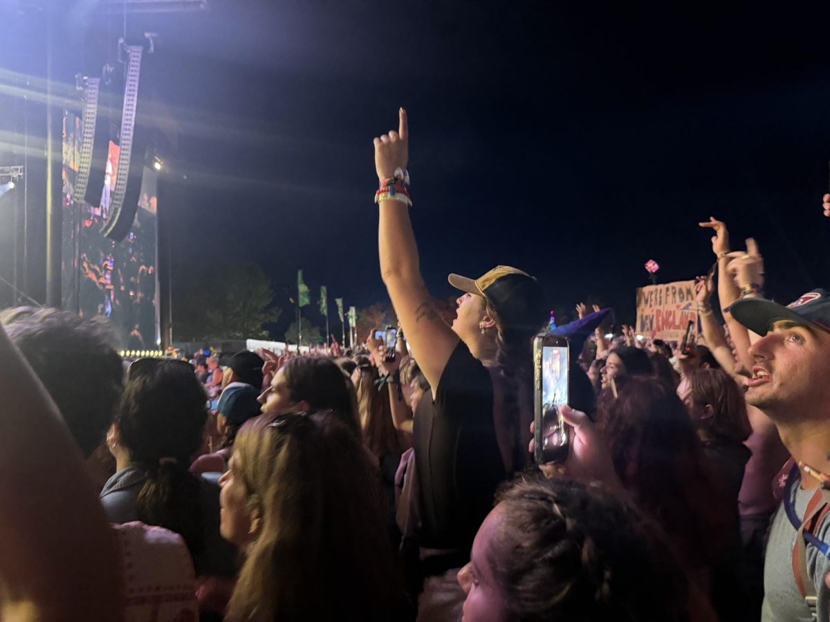 Fan raises hand in the What Stage pit for Noah Kahan at Bonnaroo Music & Arts Festival in Manchester, Tennessee, on June 14, 2026.