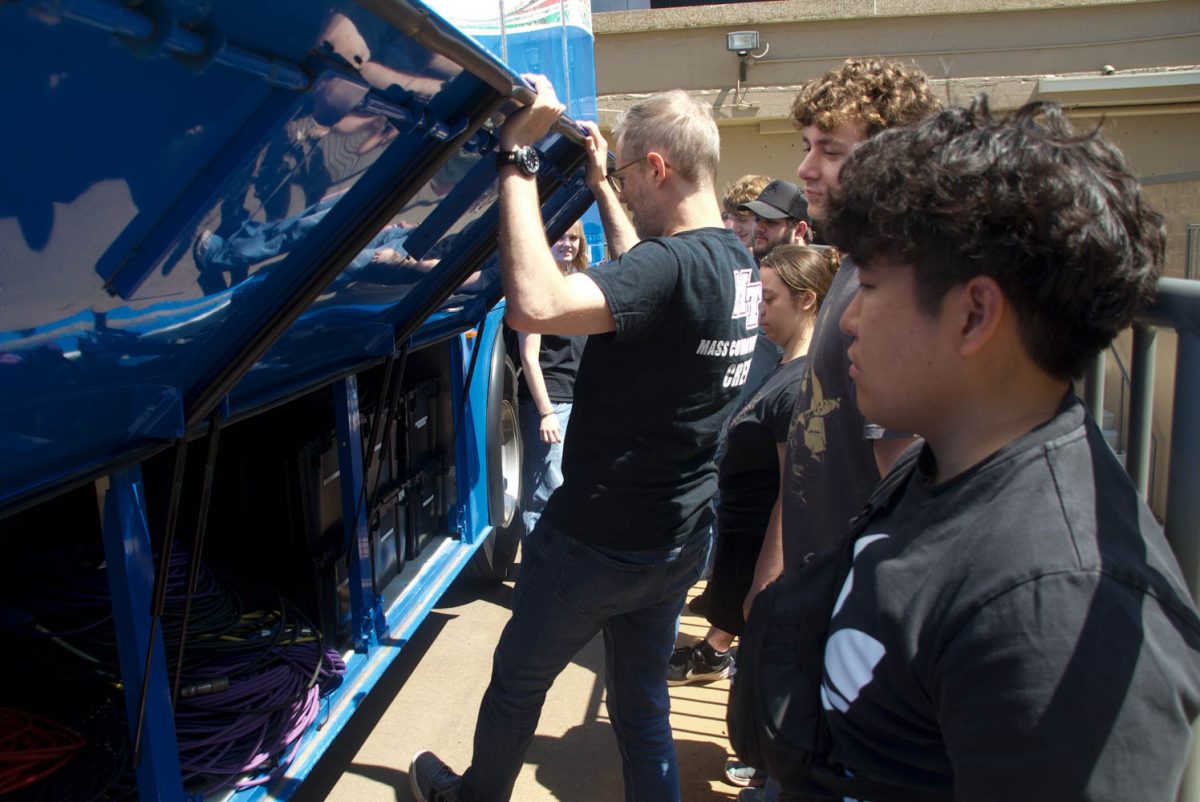 A group of Middle Tennessee State University Mass communication students gathered around MTSU’s Mobile Production Lab to learn about cables at the Murphy Center on June 2, 2026.