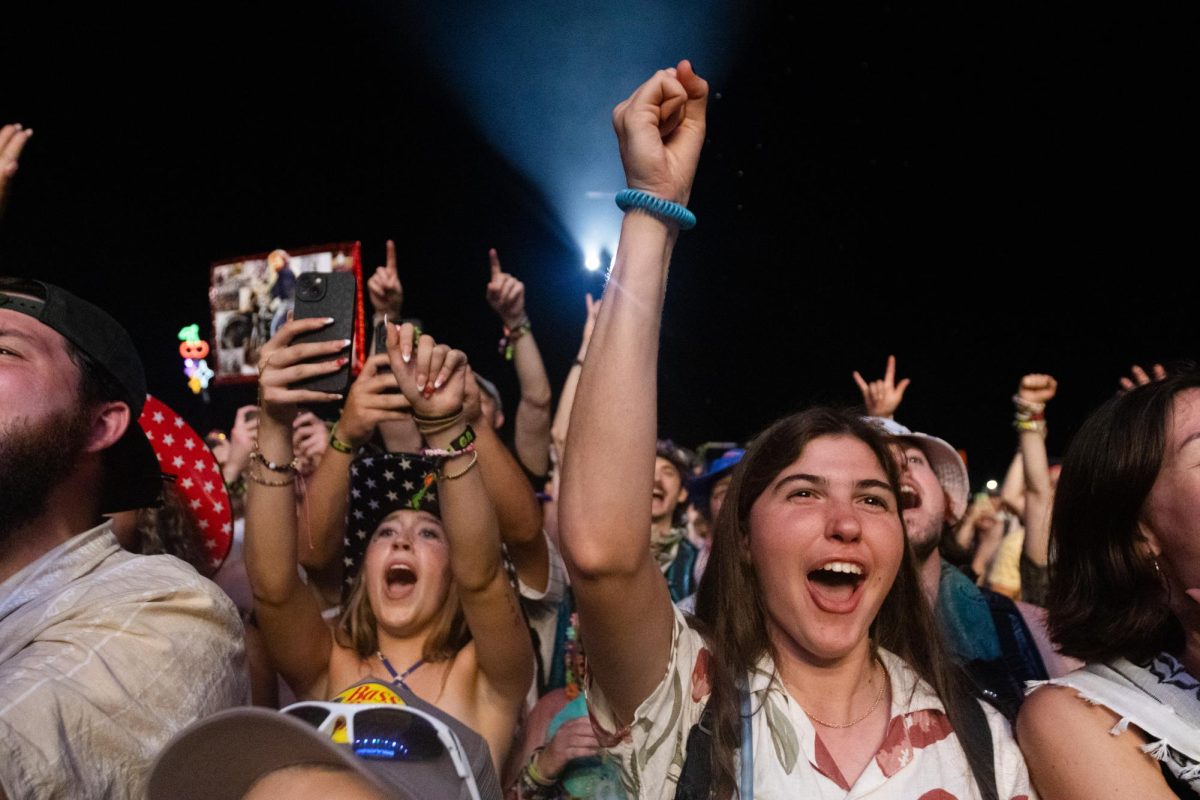 The crowd cheers as Luke Combs performs his set at Bonnaroo Music & Arts Festival on Friday, June 13, 2025.